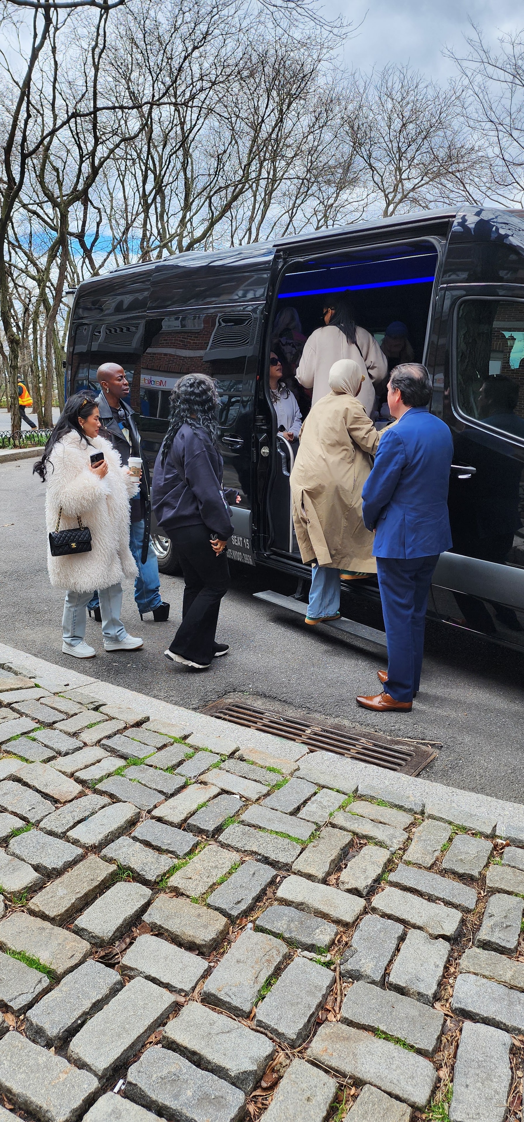 Black executive Sprinter van — chauffeur service